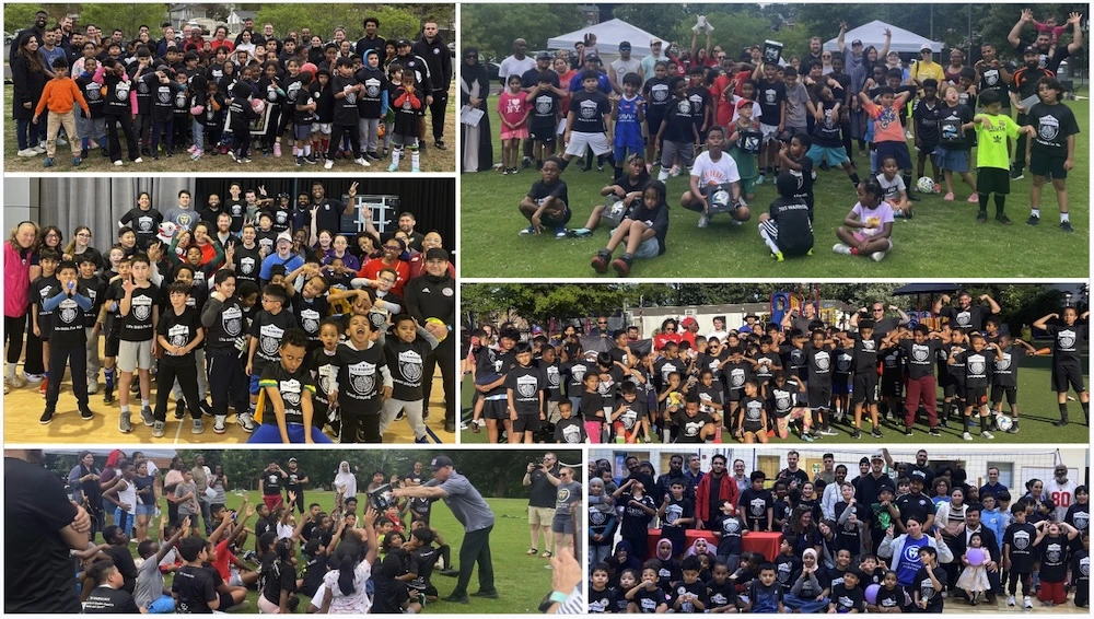 A large, diverse group of 703 Warriors kids and coaches in a huddle